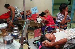 Friends and family comfort potential victims of the death epidemic in Manila.